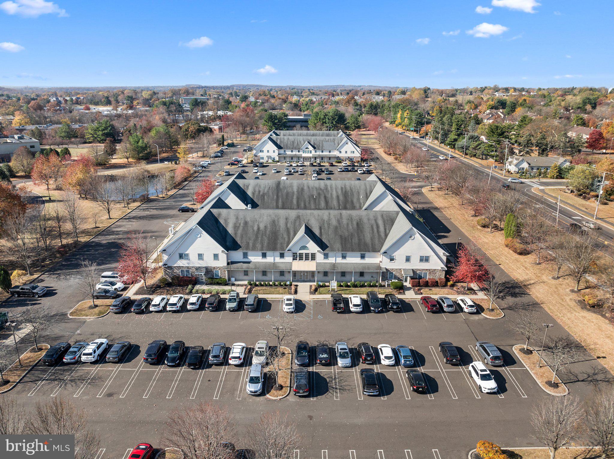 NEWTOWN BUSINESS COM - Commercial Lease