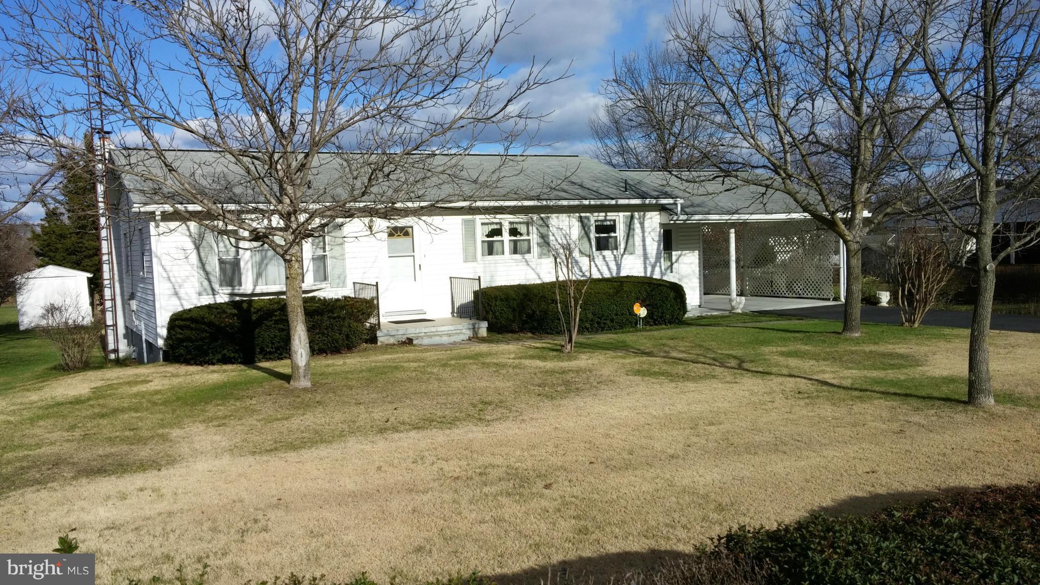 Great location, move-in condition. Very well-maintained rancher with hardwood floors (LR carpeted over), Three bedrooms, one bath, family/tv room, carport, basement partially finished with extra kitchen for summer cooking & entertain in attached sunroom, then walk out to level backyard. Close to schools, shopping, grocery, drug stores, bank and post office. Easy access to I-81 for commuters.