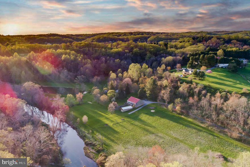 ESSENCE
Live authentically. Welcome to River Bend. Take the road less traveled. Revel in the sense of arrival as you meander through the woodlands to an oasis like no other. The Gunpowder River stretches before your eyes. An enormous pond is revealed. A romantic old stone manor house stands tall with endearing stone barn. A sense of place draws you in. River Bend is poetry in motion. A farm for generations. Life is canvas. Paint it. A boundless place full of potential. Create memories here. Cultivate your existence. The art of uniting human and home.

LOCAL FLAVOR AND PROVISIONS
Graul's Market along with favorite local dining at Casa Mia’s, Milton Inn, Manor Tavern, Butlers Tavern, The Fill'Er-Up, The Yellow Barn, Woodfire Kitchen and The Creamery Connection. Tap into local breweries, such as Inverness Brewing, Farmacy Brewing and Big Truck Farm Brewery.

OUTINGS AND LEISURES
Explore the NCR Trail. A 21-mile flat, crushed-stone trail open to hikers, bikers, and horses, it runs along the scenic Gunpowder Falls river. Minutes to Prettyboy Reservoir. This area is open to hiking, rowing, or paddle boating, bird watching, horseback riding and nature photography year-round, and for archery hunting during a regulated season. Go tubing on the Gunpowder River. Enjoy Ladew Topiary Gardens... these gardens are 22 acres of spectacular, award-winning gardens, more than 100 remarkable topiaries, a mile-long Nature Walk, and native Butterfly House. Explore The Manor Mill, a pre-revolutionary grist mill that now houses a wide variety of art and entertainment events. Tee off at Greystone Golf Course in White Hall.

PROXIMITY
Zippy access to the I-83 on ramp, about 15 minutes to Hunt Valley, and about 22 minutes to Towson.

REGION
The Hereford Zone is a protected, rural area, covering roughly 20% of the county's land area. The community was historically centered on agriculture and still maintains that charm today.