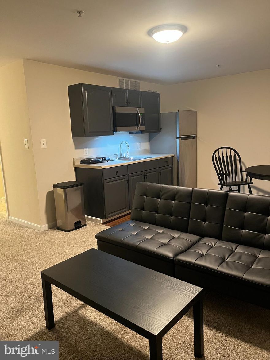 Affordable basement apartment for rent, comes with an efficiency kitchen, full bathroom, access to laundry, and a convenient location near eateries - movie theatres - nature trails - and more. The landlord lives upstairs, works night shifts,  and you will have access through the front - with rental prices on the rise, this a smart chance to make your rental money stretch because the electric and internet are included in the price.