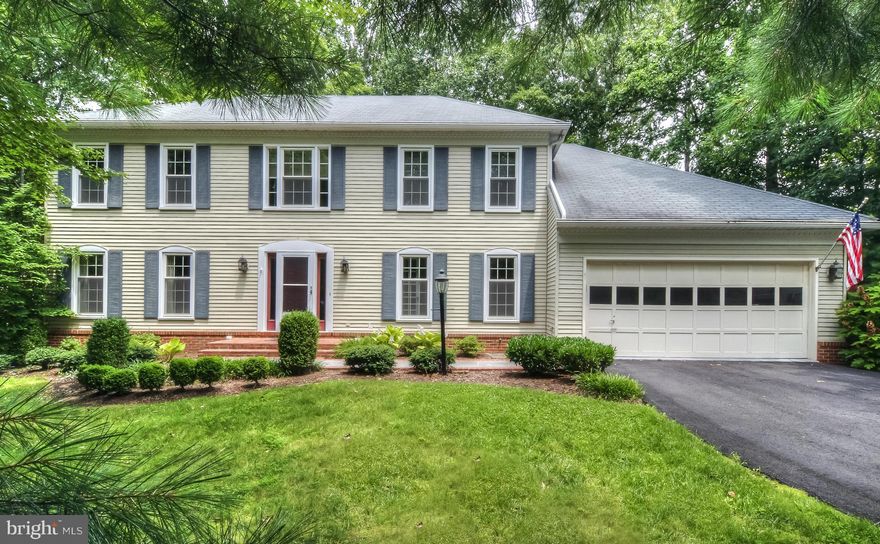 Won't last long! Enormous deck backing to private wooded lot on over a .50 acre corner lot. Remodeled kitchen with newer appliances, granite tops, hardwood floors, and island. Family room with brick FP. 2 car garage with paved drive. Large 4 bedrooms. Also For sale or Rent to own.