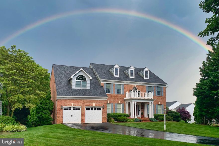 Stunning brick front colonial located on a premium lot on a cul-de-sac in sought after Turf Valley Overlook!  This home offers fresh, neutral paint throughout and many great features including a sunny, two story foyer; eat-in kitchen with pecan cabinets, gas cooking, double oven and breakfast bar; family room with new carpet, soaring ceilings and a cozy gas fireplace; formal dining room and formal living room with rich hardwood flooring and custom trim; main level bedroom/office with custom built-ins and private entrance to a full bath; convenient, main level laundry room with easy access to the two car garage.  The upper level features brand new carpet, four bedrooms and three full bathrooms including a primary suite with cathedral ceilings, sitting area, two walk-in closets and a luxury bath with soaking tub, separate shower and double sink/vanity with granite countertops. The finished, walk-up lower level features 9' ceilings; a recreation room with a pool table and home theater that is perfect for entertaining; an office or possible 6th bedroom with a full bathroom; and ample storage.  Relax on the screeded porch or private deck overlooking the well landscaped lot.  Mechanical updates include roof replacement in 2017, main level HVAC in 2016,  water heater in 2015, upper level HVAC in 2010.
