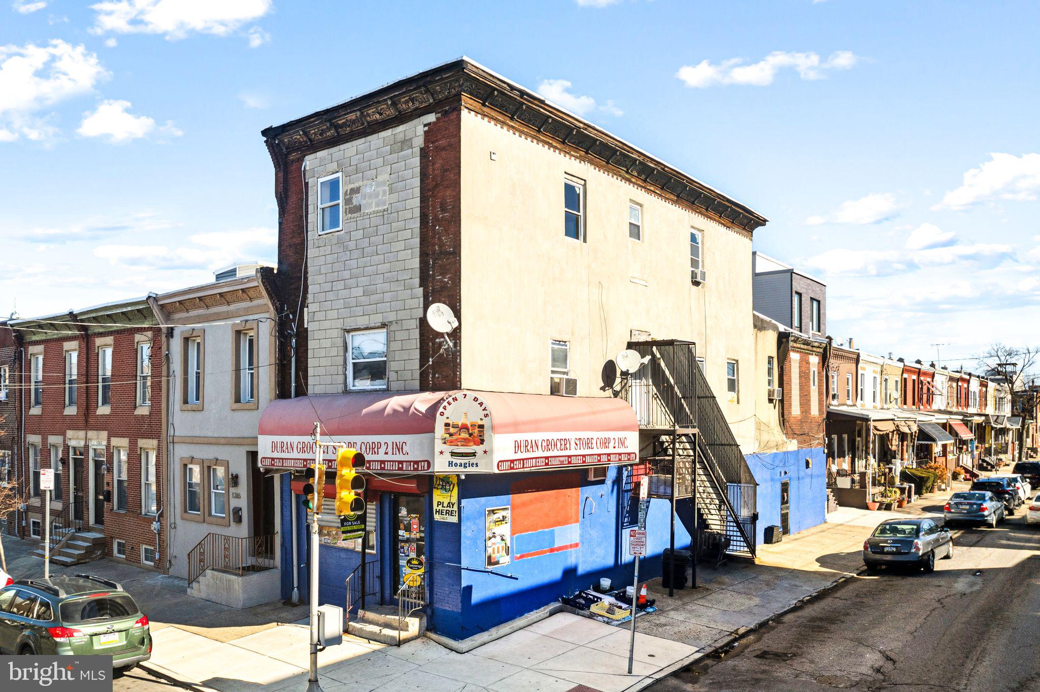 Corner 3-Story building including grocery store, and two 2-bed apartments on 2nd and 3rd floors. Corner store is currently open daily and active. 2nd floor apt is leased month to month. 3rd floor is vacant.
