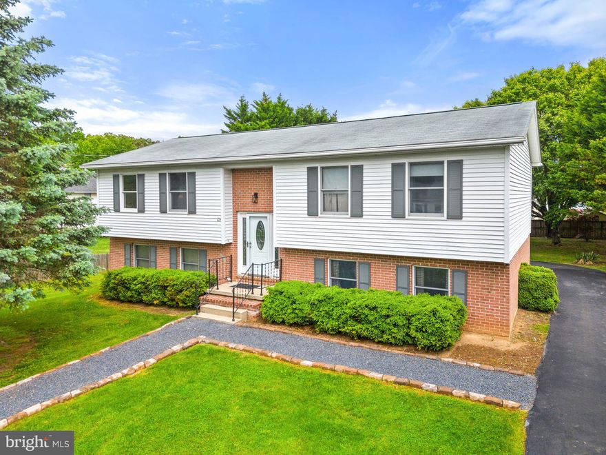 Nestled in a tight-knit community on a quiet, no thru-street, this split foyer has so much to offer. Featuring 4 bedrooms, 3 full bathrooms, and a fully finished basement with a huge rec room, there's plenty of living space for everyone. With a large family room, separate dining room, and a kitchen with a convenient breakfast bar, this home is perfect for hosting get-togethers. The primary bedroom with attached bathroom, ensures a private retreat after a long day.  Outside, the lengthy paved driveway offers ample play space for outdoor activities and leads to the 1-car garage. Whether you're looking for a space to entertain guests, host a barbecue, or simply relax, the beautifully shaded yard backs to trees and provides the perfect spot for outdoor enjoyment. Located in a prime location, close to many dining and shopping options, it's easy to run errands and enjoy the local attractions. The home could benefit from some updating and has been priced accordingly.