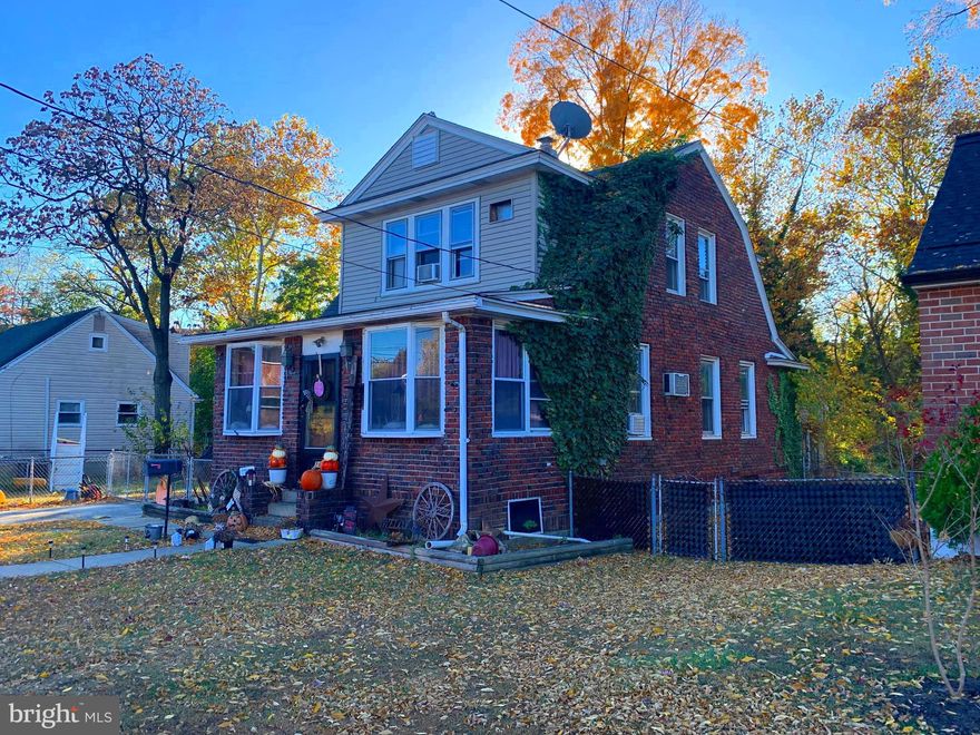 MOTIVATED SELLER >Significant Price Drop ! Fix up value around $450k ! Buyer default brings this back to market. Brick Colonial on extra wide lot tucked away in a quiet corner of Ridley Twp.  3 Bedrooms, 1.5 Baths, oversized 2 car Garage, large fenced yard. MAIN LEVEL Enter the enclosed front porch/sun room, Living Room with c/fan, spacious Dining Room with hardwood floor, Kitchen with c/tile floor, wall oven, gas range, Powder Room and Mud Room with door to outside. UPSTAIRS there are 3 Bedrooms, C/ Tile Hall Bath with tub/shower combo. BASEMENT is unfinished, there is a rough in for Bath, and steps up to rear enclosed Sun Porch with Bar & sliders to yard. BRAND NEW WATER HEATER (1/25). Many great features in this home. Indoor & Outdoor living spaces, great for entertaining. Overlook the contents and you can see how wonderful this home really is.