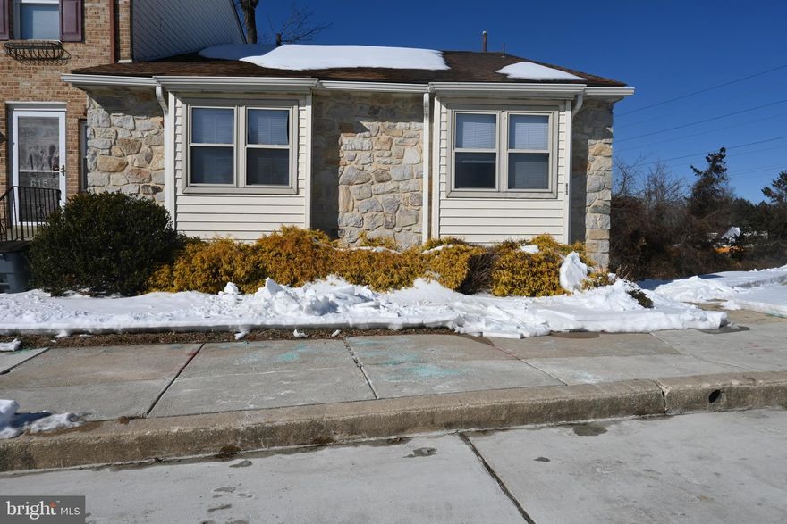 Welcome to 613 Saint Anthony, an end-unit rancher in Lukens Estate with fresh paint, new carpets and newer luxury vinyl plank flooring. Just minutes from restaurants, shopping, parks, and a quick trip to downtown Philadelphia. Once inside you will  be in the large open living room with plenty of light and a large double‑sided brick fireplace. The dining room with the double sided fireplace has a newer sliding door that opens to a rear deck perfect for morning coffee. The kitchen offers ample cabinet and counter space, plus a spot ideal for a coffee bar. Newer Refrigerator and Gas Oven. Down the hall is the master bedroom with a full bath and new wall to wall carpet and large closet. The second bedroom has new wall to wall carpet and large closet. The third bedroom is set as a bedroom but was previous used as a laundry and can easily be converted back to a laundry. There is a ceramic tile full hall bath. 
A major highlight is the expansive unfinished basement with high ceilings and walk‑out access—ideal for additional living space or even an in‑law suite. Newer Washer and Dryer. New water heater. Roof (2019) and systems are in good condition, with HVAC serviced yearly.
Located on a quiet, friendly street, this townhouse offers community amenities and convenient access to public transportation and schools. Come take a look!