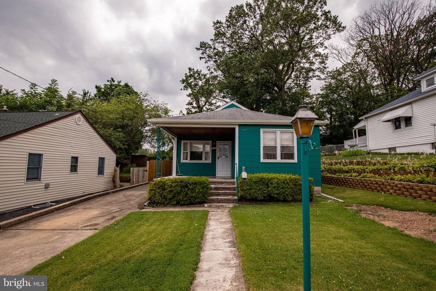 Single family rancher in Parkville features private driveway, porch front and fenced rear yard. Kitchen and dining combo*Hardwood Floors*Three bedrooms*Unfinished lower level*Don't miss this great opportunity! Property being sold as-is.