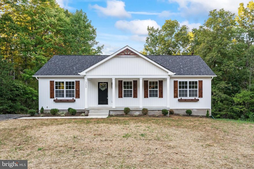 FINISHED NEW CONSTRUCTION! Gorgeous 3 bedroom 2 bath rambler on 3.28 acres! This light and airy home features stainless steel appliances, hardwood floors, barn door accessible pantry, exposed wooden beams, modern fixtures, tiled bathrooms, and much more!