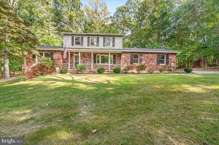 Tucked away on 3 private wooded acres, 355 Nathan’s Drive is more than a home — it’s a retreat. Surrounded by nature and free from HOA restrictions, this property offers the peace and privacy you crave while keeping you close to everything Westminster has to offer.

The main level features a welcoming family room anchored by a cozy wood stove, a formal living room, a formal dining room, and an eat-in kitchen designed for everyday comfort. A conveniently located half bath and laundry room just off the family room add to the home’s functionality. Upstairs, you’ll find three spacious bedrooms and two full baths, including a private primary suite.

Outdoor living is at the heart of this property. Sip coffee on the inviting front porch, host gatherings on the expansive rear deck that spans the length of the home, or explore the wooded acreage that surrounds you. Two sheds and a 2-car garage provide ample storage and room for hobbies, while the unfinished basement with a rough-in offers endless possibilities for expansion — a recreation space, home gym, or office.

Here, you’ll enjoy the rare combination of tranquility and convenience — minutes from shopping, dining, and commuter routes, yet worlds away from the hustle and bustle.