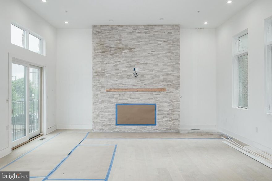 Where do we begin?....Plunge Pool on the roof deck, Outdoor kitchen, 6-stop elevator, CORNER home with windows facing the River and the Ben Franklin Bridge in every room!! 2-car garage, tax abatement, 240 Bottle temperature controlled custom Glass wine cellar, 60" Fireplace with stone surround, media rm wired for Projection screen & much more. This custom new construction home is part of a gated luxury community. This corner home has 5 bedrooms plus a bonus room/office with coffee station & media room. The main living level is simply stunning with amazing ceiling height, wide open floor plan & designed fireplace wall and custom wine room.  You will not see a home like this anywhere in Philadelphia! Some other amenities include a 75" TV in the living room, Heated living room floors, wet bar w/ beverage center, Smart home technology included-control 4 home automation package & custom wood stairs w/ iron railing system... If you need a home to entertain 100+ people this is it! The magnificent kitchen includes a Wolf/Sub-Zero appliance package, custom cabinetry, custom counter-tops with waterfall edges, large peninsula for entertaining, custom lighting & amazing ceiling height. The baths have seamless glass showers, designer vanities & fixtures & tile that will blow your mind. The roof deck is one of kind,w/ flooring made of elegant porcelain pavers, a plunge pool, an outdoor kitchen & a party room pilot house with bath, elevator access, lounge area & wet bar. This home will be famous when completed. Get in now before all finishers are installed. Top of the line insulated Marvin windows t/o, master bath has a free standing tub & dual showers, custom closet systems throughout, grand vestibule entryway, full sized laundry room with whirlpool washer and dryer included, 4" LED lights t/p, solid core high quality doors, energy efficient mechanicals including multi zoned HVAC systems. A wonderful location surrounded by multi-million dollar homes & condos, walk-able to dozens of top rated restaurants, plus skyline, bridge and river views from every room on every floor... this home has 63 foot of frontage facing the water and the bridge! Live in the center of it all. Truly a magnificent residence. The home is sheet-rocked, painting begins shortly, delivery date 12/30/2018. Builder Warranty included. Check OPA for 2019 taxes due to possible citywide reassessment. Square footage total includes above grade space and below grade space and is estimated.Ask us about the Wells Fargo paid closing costs promotion for this development- Buyers may be eligible for a closing cost credit of 0.25% paid by Wells Fargo. Also a 24 month extended rate lock is available with a rate float down feature!!