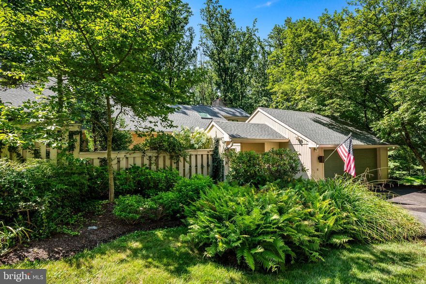 Toft Woods is a hidden gem carriage home located at the Newtown Square and Media border near Ridley Creek State Park in Upper Providence Township. This gorgeous home offers a 1st floor updated primary suite plus a daylight lower level with an in-law suite potential with its own one-car garage and private patio overlooking the woods. Enjoy the amazing scenic nature views and serenity you deserve at 50 Toft Woods Way yet only 5 minutes to shopping in Newtown Square.  This is the home you have been dreaming about!   Gorgeous updates throughout this lovely and meticulously maintained carriage home. 4 BR / 3.5 BA with a first-floor Primary suite plus a two-car and a separate one-car garage. This home is an amazing home with a relaxing, fenced-in and bright, and cheery courtyard plus a front covered patio. A welcoming two-story foyer with hardwood floors leads you to the gracious formal living room with a fireplace and stunning views of the wooded area behind this home. Toft Woods is comprised of 40 homes nestled on 40 acres in this low-density townhome community. The formal dining room is adjacent to the large gourmet kitchen with quartz countertops, cherry cabinets, and stainless steel appliances as well as seating at the kitchen island and room for a breakfast table near the pantry. One of the two decks is accessible via sliding glass doors for you to dine outside to enjoy the scenic nature views. The family room with a two-story stone fireplace with custom built-ins and a wet bar also offers you access to the other rear large deck for you to relax and or entertain family and friends. Also on the main level of this home is the first-floor primary bedroom suite, complete with a spa-like new bath with a large walk-in tiled shower and a stylish soaking bath. The second level features a large loft with skylights and custom shelving units in an area now utilized as an office. There are also 2 spacious bedrooms with large walk-in closets, plus a walk-in attic storage, and a full bath on this level. The finished lower level offers the opportunity to turn the entire level into a second living area for guests and or family, featuring a large media area, bedroom with large closet, full bath, dining area, plus another area for an office, workout area or additional bedroom.  Rose Tree Media School District. Easy access from this level to a large patio overlooking the woods. The one-car garage is on this level as well. Located 5 minutes to Whole Foods and the many new restaurants and shoppes in Newtown Square as well as Trader Joe's and the restaurants and shoppes in Media where you can enjoy, " Dining under the Stars" and the many activities and concerts at Rose Tree Park, Tyler Arboretum and Ridley Creek State Park with its walking trails, fishing and horseback riding. My favorite paved trail is over the quaint bridge about 2 minutes from this home, where I enjoy walking my golden retriever along the Ridley Creek. Of course, she needs to enjoy a quick swim in the creek as well! Conveniently located to the Philadelphia Airport, Rt. 1, Rt. 476, and Rt. 95 for easy access to Wilmington as well. Click on the video camera icon to view the property video of this amazing home.