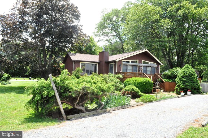 Welcome to Tolchester Estates.  This 2 bedroom 2 bath home would be perfect for a summer retreat or to live at year around offering stunning views of the Chesapeake Bay from your kitchen, dining room, and rear deck!  This home is situated on nearly a half an acre with a 2 car detached garage.  The property also features a well house w/ water treatment system and basement for additional storage and a gazebo to relax outdoors.  Off the master bedroom there is a wonderful 8x15 sun room perfect for relaxing or additional space.  The partially finished basement with walk out egress and a full bathroom offers endless possibilities.  Put this home on your list to tour, you will not be disappointed.
