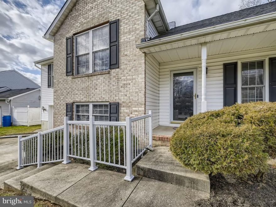 Welcome Home! This home has been thoughtfully updated and maintained.  It  has such a great flow and separation between the  living/entertaining space and sleeping areas.  As you walk in, you are greeted with an ample size living room with vaulted ceilings.  The vaulted ceilings continue into the kitchen and dining space.  The entire main floor and upper level are covered in hardwood floors and the kitchen has been updated with Quartz counters and beautiful gold accents.  Also, enjoy your year round sitting area off of the dining room, leading out to the fully fenced yard.  The bottom level includes an oversized one car garage, living space, additional sitting area, half bath, laundry, and built in storage area.  As you move to the top floor, you will notice all of the added touches- such as the custom barn door and bedroom chandeliers.  One bedroom has even been converted to a full walk in closet.  Come see for yourself, and make this your new home.