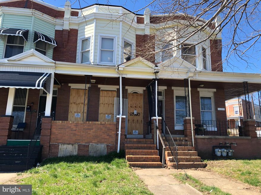 Excellent for investors! Gorgeous porch front brick  3bed, 2bath townhome with garage, Hardwood 1st & 2nd floors. across from Clifton Park and Golf course. In need of some updates, good fixer-upper. The seller will make no repairs.  As-Is