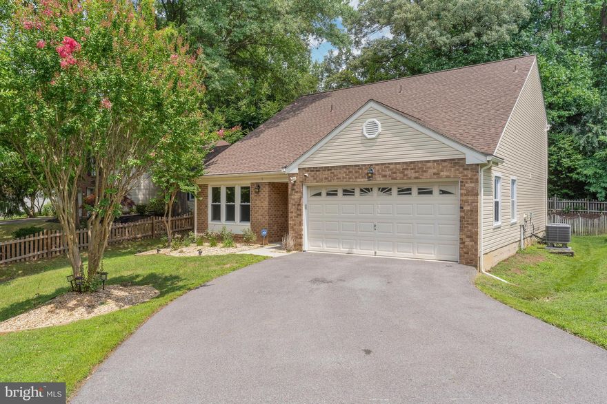 Nicely updated home on private lot inside the Crofton Triangle* Immaculate, with recent Kitchen cabinets, appliances, and counters* Tile flooring on main level, hardwood flooring on upper level* Updated bathrooms*