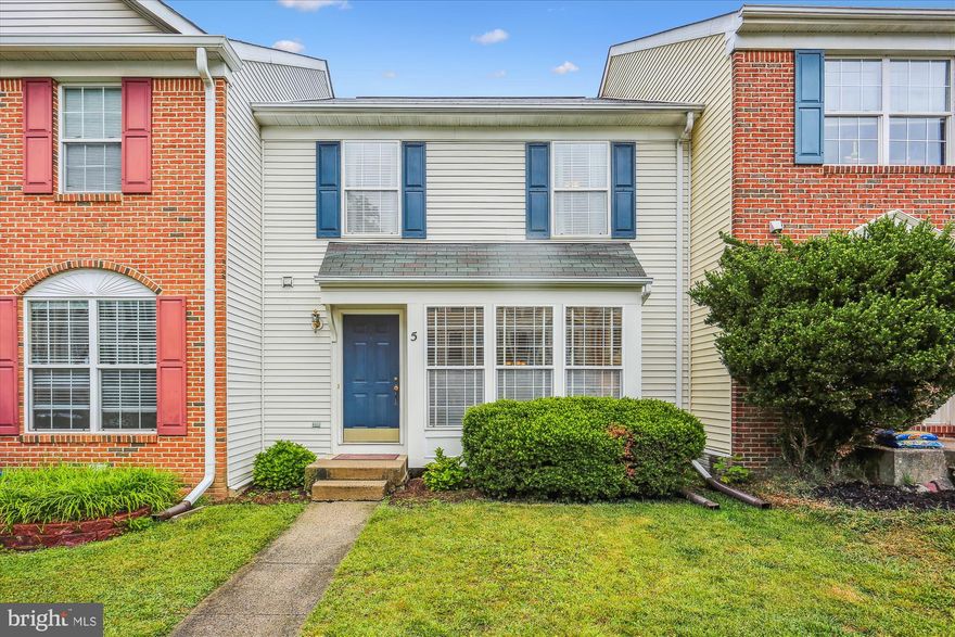 Stunning 3BR/2FB/HB townhome located in sought after Manor Ridge neighborhood backing to woods. This home features approximately 2,000 square feet of living area on three levels including a great sense of light and spaciousness with designer home appeal, custom window treatments and paint and floor-to-ceiling windows.  Foyer and living room with gleaming hardwood flooring, box/bay window, crown moulding, adjacent powder room and separate dining room with pass through to the kitchen, updated gourmet kitchen featuring granite countertops with undermount sink, recessed and pendant lighting, hardwood flooring, oak cabinetry, stainless Whirlpool dishwasher/refrigerator, GE double oven, pantry and separate breakfast area with sliding glass door to freshly stained deck overlooking woods. Upper level primary bedroom suite with double door access, vaulted ceiling, carpet, ceiling fan and walk-in closet; primary bathroom with ceramic tile flooring, dual vanities with new light fixture, separate walk-in shower and soaking tub; two additional bedrooms (one with dual closets) on upper level with ceiling fans, full bath with ceramic tile flooring and tub/shower and laundry area with upper cabinets in hallway.  Fully finished walk-out lower-level recreation room with wood burning fireplace, carpet and recessed lighting; separate storage room with rough-in for bath, new grinder pump and additional storage underneath stairs. Other features include two assigned parking spaces in front (#11 &12) with nearby visitor parking and tot/lot playground. Conveniently located near major commuter routes (ICC, I-270, 355), Shady Grove Metro, restaurants, and shopping.