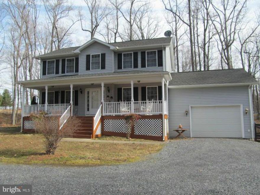 Private setting awaits you just 15 minutes from Warrenton. Relax on the wonderful front porch & watch nature!  Sun-filled  kitchen w/ breakfast nook opening to FR w/ gas fireplace.  Formal dining room, living room/den with custom shelves, master with walk in closet, 2 additional bedrooms and laundry on upper level. Walk out basement to patio. Garage, fenced backyard, creek and open space!