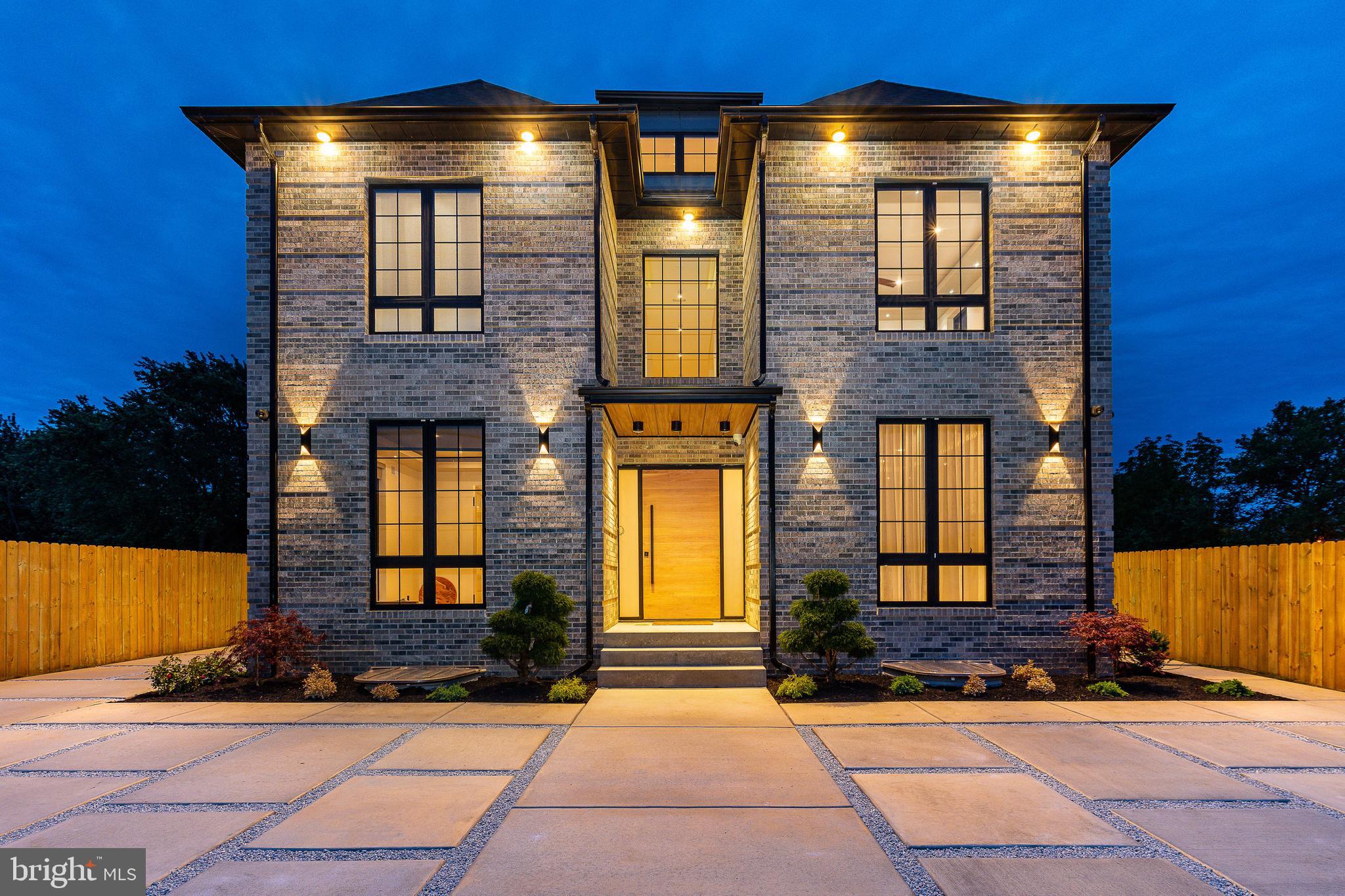 Welcome to 9739 Krewstown Road, a meticulously designed smart home boasting unparalleled luxury and premium finishes throughout. This magnificent residence offers the perfect blend of sophisticated design and cutting-edge technology, promising an extraordinary living experience both indoors and out. Adding to its appeal, this property benefits from 9 years remaining on its tax abatement, offering significant annual savings. inside and discover an expansive open-concept layout bathed in natural light, showcasing premium Brazilian hardwood flooring throughout. The heart of the home is a chef's dream kitchen, fully loaded with top-of-the-line stainless steel appliances, sleek custom cabinetry, and oversized Taj Mahal quartzite island perfect for entertaining. Multiple dining areas, including a formal dining room and a casual breakfast bar, offer versatile spaces for every occasion. The living areas are designed for both grand entertaining and intimate relaxation, featuring spacious lounges with integrated smart home controls for lighting, climate, and entertainment systems. Retreat up to the lavish master suite, a true sanctuary boasting ample space, serene ambiance, and a spa-like en-suite bathroom with an oversized walk-in shower, dual vanities, and exquisite marble finishes. The second level continues this dedication to luxury and comfort, featuring 4 generously sized bedrooms, each a private haven with its own en-suite bathroom, walk-in closet, and private balcony. For ultimate convenience, a dedicated laundry room is also located on this upper level. Descend to the fully finished basement, a true extension of the living space, offering impressive 10-foot ceilings that create an airy, open feel. This lower level features two additional spacious bedrooms, a full kitchen and an additional full luxurious bath, perfect for guests, an in-law suite, or a private retreat. Step outside to discover an entertainer's paradise. The property boasts multiple outdoor living areas, including a spacious deck perfect for al-fresco dining. Enjoy the expansive, well-maintained backyard, fully fenced for privacy and offering plenty of space for recreation. The sleek, modern exterior features a striking combination of stone and contemporary siding, complemented by meticulously landscaped grounds and ample driveway parking. Every detail in this home has been thoughtfully curated to provide the ultimate in modern living. From its smart home integration to its high-end finishes, impressive architecture, and incredible outdoor spaces, this residence is more than just a house; it's a lifestyle. Don't miss the opportunity to own this exceptional property. Schedule your private showing today and experience the pinnacle of luxury living.