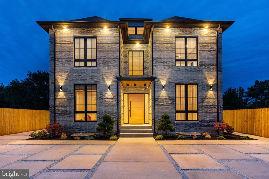 Welcome to 9739 Krewstown Road, a meticulously designed smart home boasting unparalleled luxury and premium finishes throughout. This magnificent residence offers the perfect blend of sophisticated design and cutting-edge technology, promising an extraordinary living experience both indoors and out. Adding to its appeal, this property benefits from 9 years remaining on its tax abatement, offering significant annual savings. inside and discover an expansive open-concept layout bathed in natural light, showcasing premium Brazilian hardwood flooring throughout. The heart of the home is a chef's dream kitchen, fully loaded with top-of-the-line stainless steel appliances, sleek custom cabinetry, and oversized Taj Mahal quartzite island perfect for entertaining. Multiple dining areas, including a formal dining room and a casual breakfast bar, offer versatile spaces for every occasion. The living areas are designed for both grand entertaining and intimate relaxation, featuring spacious lounges with integrated smart home controls for lighting, climate, and entertainment systems. Retreat up to the lavish master suite, a true sanctuary boasting ample space, serene ambiance, and a spa-like en-suite bathroom with an oversized walk-in shower, dual vanities, and exquisite marble finishes. The second level continues this dedication to luxury and comfort, featuring 4 generously sized bedrooms, each a private haven with its own en-suite bathroom, walk-in closet, and private balcony. For ultimate convenience, a dedicated laundry room is also located on this upper level. Descend to the fully finished basement, a true extension of the living space, offering impressive 10-foot ceilings that create an airy, open feel. This lower level features two additional spacious bedrooms, a full kitchen and an additional full luxurious bath, perfect for guests, an in-law suite, or a private retreat. Step outside to discover an entertainer's paradise. The property boasts multiple outdoor living areas, including a spacious deck perfect for al-fresco dining. Enjoy the expansive, well-maintained backyard, fully fenced for privacy and offering plenty of space for recreation. The sleek, modern exterior features a striking combination of stone and contemporary siding, complemented by meticulously landscaped grounds and ample driveway parking. Every detail in this home has been thoughtfully curated to provide the ultimate in modern living. From its smart home integration to its high-end finishes, impressive architecture, and incredible outdoor spaces, this residence is more than just a house; it's a lifestyle. Don't miss the opportunity to own this exceptional property. Schedule your private showing today and experience the pinnacle of luxury living.