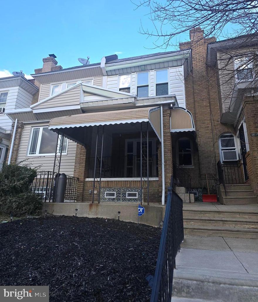 Updated, confident, and positioned exactly where buyers want to be. This 3-bedroom with a possible 4th Bedroom/bonus room rowhome delivers a refreshed interior paired with a rear deck that adds real lifestyle value, not just a checkbox feature. Inside, the layout feels purposeful and functional, with defined living and dining spaces, comfortable bedroom sizes, and a finished basement that offers flexibility for storage, workspace, or future finishing.

Outside, the deck creates an easy extension of the home, perfect for morning coffee, evening downtime, or casual entertaining. An attached garage adds convenience, while the classic brick construction provides the solid feel buyers expect from a Philadelphia rowhome.

Location seals the deal. Close to shopping, everyday essentials, local eateries, and public transportation, this home keeps you connected without sacrificing neighborhood feel. Easy access to transit routes makes commuting simple, while nearby retail and dining options keep weekends effortless.

Move-in ready with updates already handled and upside still available, this property works whether you’re buying to live, invest, or position for future appreciation. Clean, solid, and well-located. This is the kind of home people schedule showings for the same day they see it.