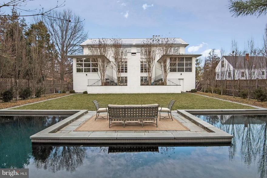 One of a Kind Residence centrally located in Arlington; only moments to DC. 3 levels w/over 5,000SF (approx) of the finest finishes & amenities including Teak & Flagstone floors, high-end audio & lighting systems, green features, & top-of-the-line appliances. Expansive Terrace overlooks gardens & lawn leading to salt water Pool & Pool House w/kitchenette, additional BA, & Steam Rm.