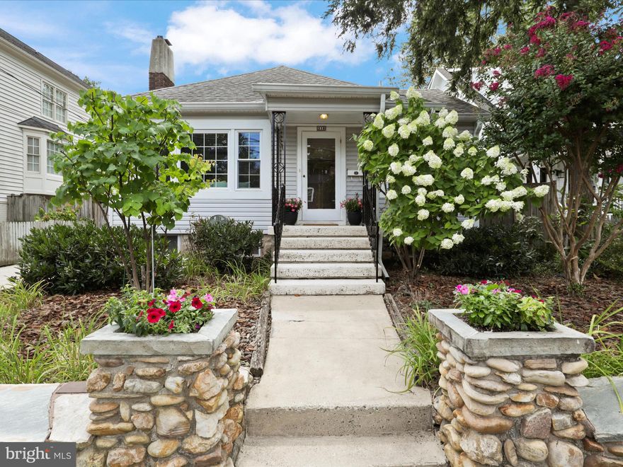 Step into this beautifully expanded Sears, Roebuck and Co bungalow, originally built in 1920.  This 2-bedroom, 2-bathroom home offers a blend of vintage charm and modern conveniences, making it the perfect retreat in the highly sought-after Lyon Park/Clarendon neighborhood.  As you enter, you'll be greeted by timeless architectural details, including elegant arches and parquet floors.  the living room and dining room provide an inviting space for formal gatherings, while the cozy den, with its charming knotty pine walls and a perfect reading nook, offers a tranquil space to unwind.  The primary bedroom features convenient access to the primary bathroom, ensuring privacy and comfort.  The kitchen boasts ample cabinetry and flows seamlessly into the sunroom, making it an ideal space for entertaining.  Step out onto the small deck from the sunroom to enjoy a private backyard lush with greenery, perfect for outdoor relaxation.  A screened-in porch off the dining room offers additional space for enjoying the outdoors, free from the elements.  The unfinished basement offers plenty of storage and presents a blank canvas for you to create your own personalized space, whether it's a home gym, workshop, or additional living area.  With no HOA restrictions, this character-filled bungalow is also a fantastic option for short-term rentals.  This unique opportunity allows you to own a piece of history while enjoying the convenience of urban living with easy access to popular dining, shopping, and entertainment.  Commuters will also appreciate easy access to the Clarendon Metro.