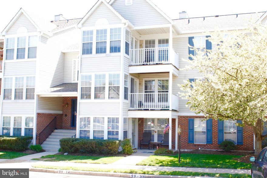 Spacious 2nd floor unit w/ new laminate floors throughout. Updated tile in both bathrooms. Oversized galley kitchen w/ separate dining room (or sunroom), leading to covered balcony. Full size washer/dryer in unit. One assigned parking spot w/ plenty of visitor spots out front. Energy efficient unit with new air handler & H2O heater. Electric averages $50/month. Furniture can convey if desired!