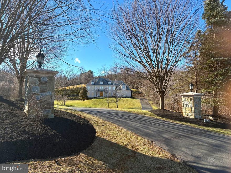 Welcome to The Villa!  An elegant Renaissance-built home in Beacon Hill:  This exquisite home, set on 4.69 acres, is the epitome of timeless elegance.  From the Double door entry into the two story foyer, oversized living and dining rooms, step down family room with fireplace and a wall of windows, gourmet kitchen, office, two half baths, laundry and entry to the three car garage.  Upstairs boasts the primary suite with a sitting room, fireplace, balcony with stunning views, full walk in closet large enough to be a bedroom, oversized bath and tons of light!  Three additional bedrooms all en suite, brand new plush carpet, front and back stairs,  plenty of space to enjoy the views from every room!  This home is NOT in a flood plain.  Check FEMA mapping for verification.  Sellers do not pay extra insurance as it is not impacted.  Map is attached to Documents.