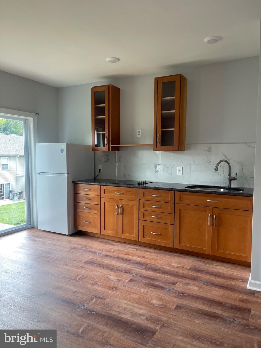 Newly renovated basement studio apartment available in a multi-unit townhouse in the vibrant and historic Belmont neighborhood! This stylish and modern unit is offered at $1,250/month with all utilities included.
Enjoy a thoughtfully updated living space featuring a luxurious all-marble walk-in shower, in-unit washer/dryer, and fresh finishes throughout. Pets are welcome — ask for details!
Located in the heart of Belmont, you're just minutes from trendy cafes, boutique shops, and a thriving local arts scene. Belmont offers the perfect mix of city energy and neighborhood comfort — schedule your private showing today!