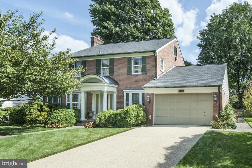 New Price! Renovated colonial in Chevy Chase! Fabulous gourmet kitchen/family w breakfast area, french doors to patio w pergola, yard and garden.   Large DR, LR, OFF with cathedral ceiling. 4 BR up inc.  master suite with large walk-in closet, renovated bath with separate shower and double vanities.  Third floor walk-up exp. space.  Lower level rec room, full bath, wine room.  Att. two car gar.