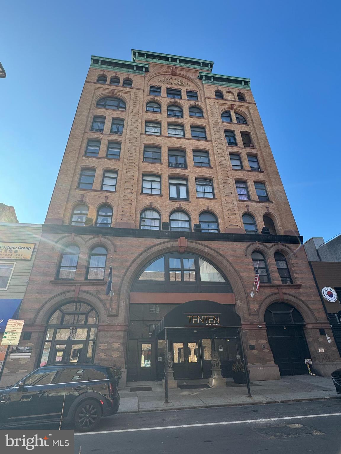 This property is a combination of 2 units into a large 2 bed, 2 bath condo on the 6th floor of historic 1010 Race Street. This corner unit is drenched with natural light with exposures facing both south and east! As you enter the unit, you are greeted with a foyer featuring hardwood floors and tall ceilings. To the right, you will find the entrance to your master suite with tons of character and charm and practically wall to wall windows and exposed brick. The master also offers an amazing walk-in closet, additional reach-in closets, center city views and an en-suite bathroom. Back in to the foyer, you have a coat closet and pantry. The hallway leads you towards your updated kitchen, featuring white cabinetry, classic subway tile backsplash, stainless steel appliances including an oven range hood and a dishwasher. The kitchen has a window looking into the living area which offers great natural light with 3 windows, a ceiling fan, a dining area, and a formal living room accented with exposed brick walls. Off the living room you will find the guest bedroom which is also very spacious offering tall ceilings, city views and a ceiling fan. The 2nd bathroom is in the common area which is perfect for when entertaining guests or hosting family and friends. This property has a great and convenient layout! Close to restaurants, super markets, highway 676, 76. All Square footage are approximate and should be verified by the buyer. Schedule your tour today!