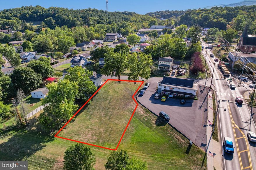 Discover a prime .30-acre commercial lot located in a high-traffic area along Route 220, which connects Cumberland, MD, to Keyser, WV. This property offers unlimited possibilities for your business venture! Key Features:High Traffic Area for maximum visibility, Electric and Water Hookups available on-site, Stunning Mountain Views to enhance the appeal, Easy Access for customers and deliveries. Potential Uses: Retail or Restaurant Development, Office Complex or Medical Facility.With its strategic location and accessibility, this lot is perfect for businesses looking to attract customers from both local and regional markets. Whether you’re starting a new venture or expanding an existing one, this property is a blank canvas ready for your vision. Don’t Miss Out! Opportunities like this don’t come along often. Contact me today to schedule a viewing or for more information about this incredible commercial lot.