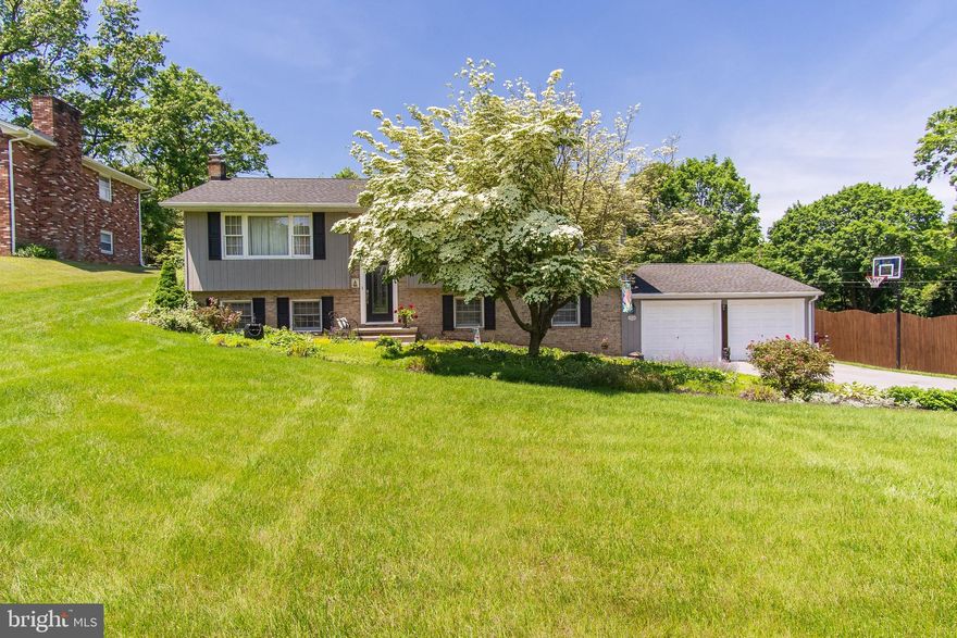 THIS IS THE ONE! Well maintained split foyer sitting on a beautiful .58 acre lot in prime Hagerstown location & in the Smithsburg MS/HS district!! Upstairs features a sunny living room, dining room with doors to rear porch, eat-in kitchen with updated appliances, Corian countertops & pine HW floors, renovated hall bathroom with jetted tub + 3 BDRM including the owners suite with attached full bath. The lower level will IMPRESS-family room with cozy freestanding gas stove, 1/2 bath & laundry room and a HUGE rec room!! The family room could serve as a 4th BDRM if desired & the 1/2 bath converted to a full bath for a complete lower level living space. The covered rear porch will make you feel right at home-amazing place to relax and entertain as you look out over the private backyard that backs to the tree line. Oversize 2 car garage with pull through rear door. Great neighborhood that is just minutes to I70, HCC, Meritus, shops, dining, parks & more + NO city taxes & NO HOA!!