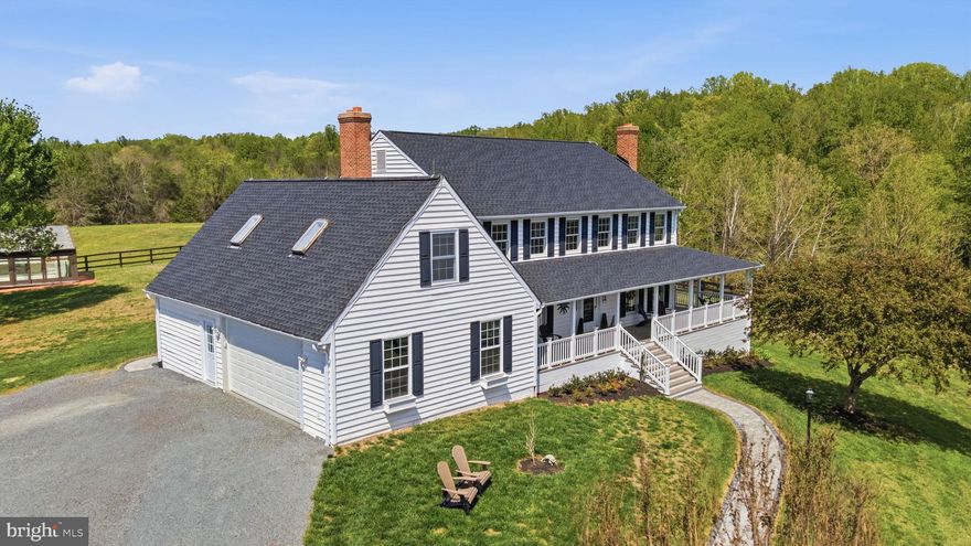 Nestled in the foothills of the Blue Ridge Mountains in historic Amissville, Virginia, Viewmont Farm is an exceptional 23+ acre private estate. Tucked into the rolling hills surrounded by the timeless charm of Virginia’s countryside, framed by mature trees and open skies, the property presents a rare opportunity to enjoy luxury living amid serene rural beauty. The grounds offer peace, privacy and abundant space for both leisure and recreation. Stroll around the private, stocked, spring-fed four-acre lake, the centerpiece of the estate. It features tranquil water views, recreational opportunities and a natural sanctuary that draws a variety of native wildlife. At its heart stands a magnificent 6000+ square foot custom-designed home with a classic wrap-around porch capturing sweeping views of gently rolling pastures, shaded woodlands and the pristine lake. Blending thoughtful design with everyday comfort, this well appointed home offers generously scaled rooms, rich hardwood flooring, crown molding throughout and windows that flood the interior with natural light bringing in the beauty of nature. Designed for both grand entertaining and quiet relaxation, the home includes multiple living spaces. A formal dining room and a living room that boasts a raised hearth fireplace and scenic views. Complete with a cozy wood stove in the family room. The recently updated gourmet kitchen with exquisite quartz countertops and all new appliances is as functional as it is beautiful. The primary bedroom, with an adjoining sitting room and recently renovated private bathroom offers all the amenities of your own personal spa, including heated floors, a towel warmer and a spacious shower.

Equestrians will appreciate the fully equipped, move-in-ready facilities. A five-stall center-aisle barn includes tack and feed rooms, a wash rack, ample storage, and a layout tailored for both convenience and horse well-being. Expansive fenced pastures support grazing and rotation, while a run-in shelter provides flexible turnout options. The land itself is a harmonious mix of open, gently rolling fields and shaded woods, ideal for riding, hiking, or simply enjoying the peaceful rhythm of country life. 

The layout of the land also makes the property adaptable for other farm animals, whether for hobby farming or just enjoying a rural lifestyle.

A versatile workshop and greenhouse provide flexibility, making this estate an inviting choice for anyone seeking space, practicality, and rural beauty.

Whether you’re seeking a private estate, an operational horse farm, or a turnkey homestead, this extraordinary property offers the space, infrastructure, and natural beauty to bring your vision to life. Conveniently located just minutes from Warrenton, Culpeper, and Northern Virginia, this Amissville gem offers easy access to shopping, dining, and commuter routes, pairing timeless elegance with modern convenience in an unforgettable setting.