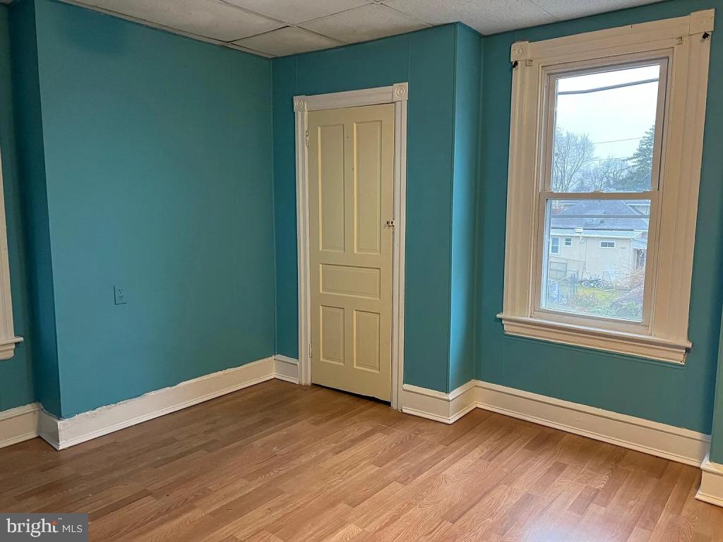 The twin house at 27 N MacDade Blvd with three large bedrooms, two bathrooms, front and back porch, basement and spacious back yard. Central Air. Close to school, transportation and shopping.