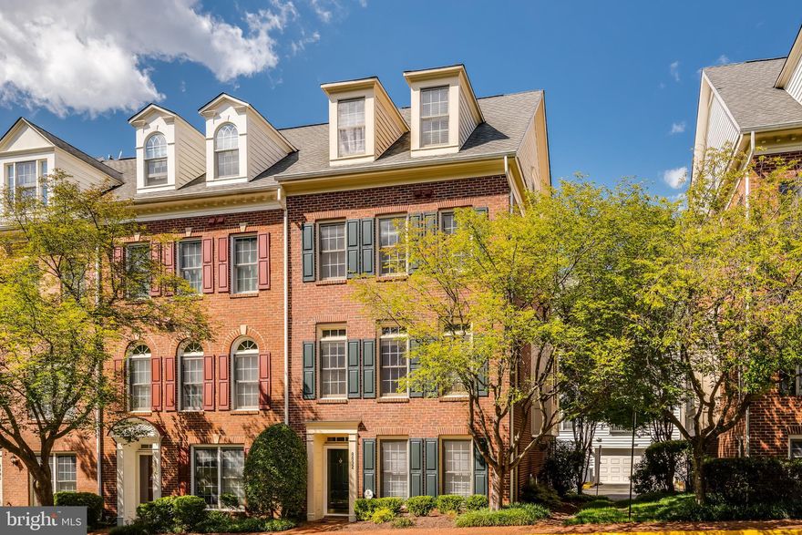 Whether you're hosting an elegant evening or simply relaxing in a thoughtfully designed living space, this townhome elevates everyday life. The architectural elegance paired with residential practicality—such as the wet bar, individual baths for each bedroom, hardwood floors and balcony—makes this a standout in both design and function.


Situated just moments from the Metro and high-end amenities, this is townhome living redefined—combining exceptional convenience with top-tier craftsmanship.


8892 Ashgrove House Lane is a distinguished, four-level, end-unit townhome that masterfully blends elegant Georgetown-inspired architecture with the convenience of Tysons Corner living. Nestled within the serene embrace of historic Ash Grove House and adjoining Fairfax County parkland and trail systems, this residence boasts both prestige and privacy. 


Key Highlights:
-Timeless design: Brick colonial-style construction featuring oak hardwood flooring throughout the upper three levels and adorned with custom-built cabinetry—perfect for refined living. 
-Entertainment-ready media room: Complete with elegant built-in shelving and a wet bar—ideal for gathering in style. 
-Gourmet kitchen: Equipped with gas cooking and tall maple cabinets, this space seamlessly supports both culinary flair and daily ease. 
-Luxurious bedrooms: Each of the three bedrooms includes its own full bathroom, offering privacy and convenience. 
-Enhanced comfort & efficiency: Rear-load, two-car garage, dual HVAC zones for customizable control, and situated as a rare end unit with exceptional natural light. 
-Prime location: Just steps from the Spring Hill Metro (Silver Line), and conveniently close to premier shopping, top-tier dining, and major commuter routes—including I-495, VA-7, VA-123, and the Dulles Airport corridor.