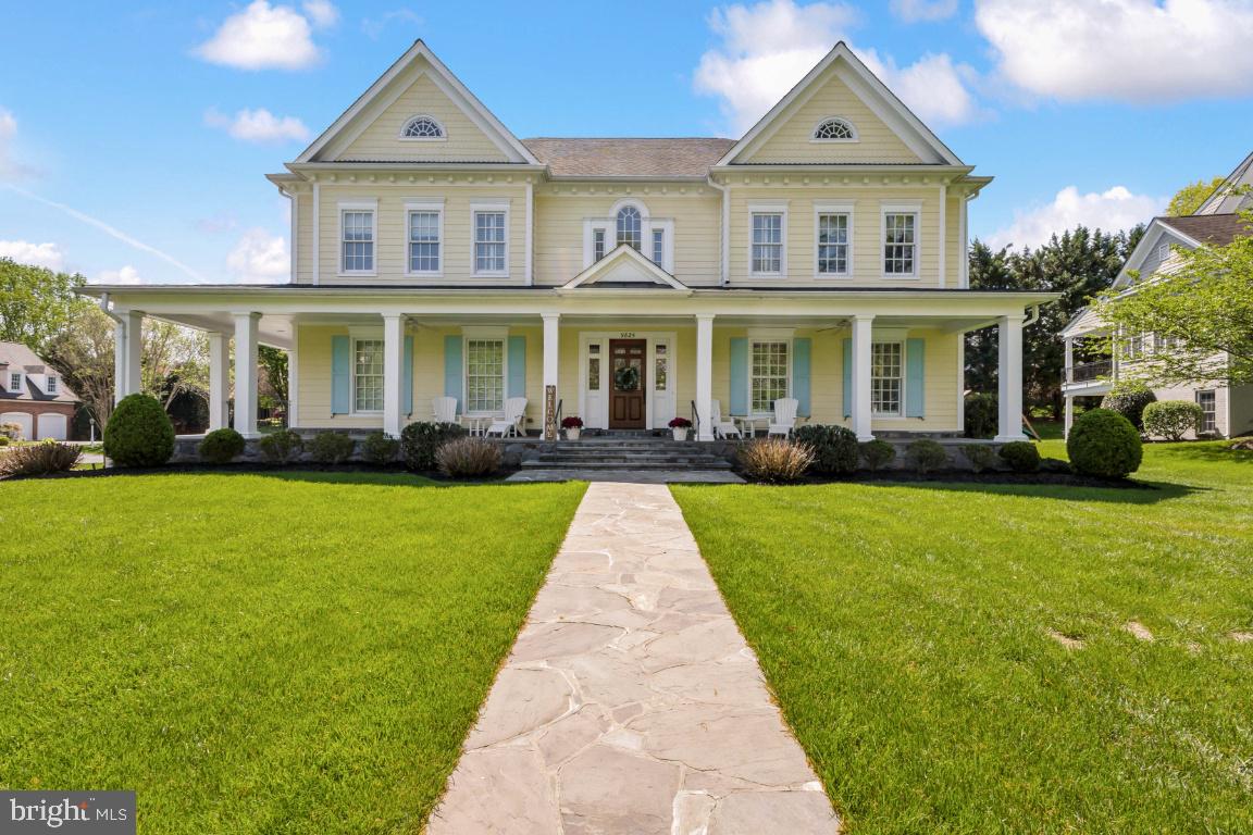 This exceptional Potomac home is the gem of sought-after McAuley Park! It is a classic Southern Colonial, custom-built in 2006 by award-winning builder Frank Bell and offered by the original owners. This showstopper 10,000 sq ft home is on a large corner lot and features five bedrooms, five full and two half baths, and five oversized gas fireplaces. This house offers grand rooms for elegant entertaining or family gatherings, epitomizing charm, graciousness, and craftsmanship. Attention to detail does not go unnoticed! From the moment you step up to the beautiful columned stone front porch, you will be charmed by the beauty of this home. Upon entering the grand foyer with a spectacular staircase and a wide front-to-back hallway, you will be captivated by the sophistication and flow of the house.
Gleaming hardwood floors, full-length light-filled windows, crown moldings, 10-foot ceilings, and impeccable millwork are throughout the home. The first floor includes a study with a fireplace and built-in bookshelves, a living room with a fireplace that flows to the dining room, an entertainer's dream kitchen, a breakfast room with a fireplace, a family room with an oversized hearth and built-in bookshelves, a mudroom with built-in storage, two powder rooms, a screened-in porch, and a stone terrace. The kitchen offers abundant custom cabinetry, an oversized island with a breakfast bar, Wolf/ Sub-Zero appliances including a 36" gas range, a wall oven, a microwave, a warming drawer, a full-size refrigerator, a full-size freezer, two dishwashers, and two farm sinks. Take the front grand or back staircases to the second floor, featuring the primary bedroom, three additional ensuite bedrooms offering spacious walk-in closets with built-ins, a sitting/study area, and a large, fully equipped laundry room. The primary bedroom is an oasis! A spacious main room features French doors opening to a sitting room with a fireplace, two oversized walk-in closets with custom built-ins, and a dressing area. The elegant primary bath has a walk-in shower, an air jet tub, two sinks, and a private water closet. The finished lower level features a private walk-out entrance. There is an Au Pair or guest bedroom suite with three large closets and a full bath. This level also includes an exercise room, a media room, a large recreation room, and a utility space. Off the mudroom is access to a spacious side-loading three-car garage and a wide semi-circular driveway with ample parking. The home's exterior, painted in 2021, is made of Hardie plank. The backyard is fully fenced and completed in 2023. Additional features include a music system throughout the home, a gas generator, an in-house sprinkler system, and much more. Easy access to Potomac Village, Democracy Shopping, and the Beltway for commuting.