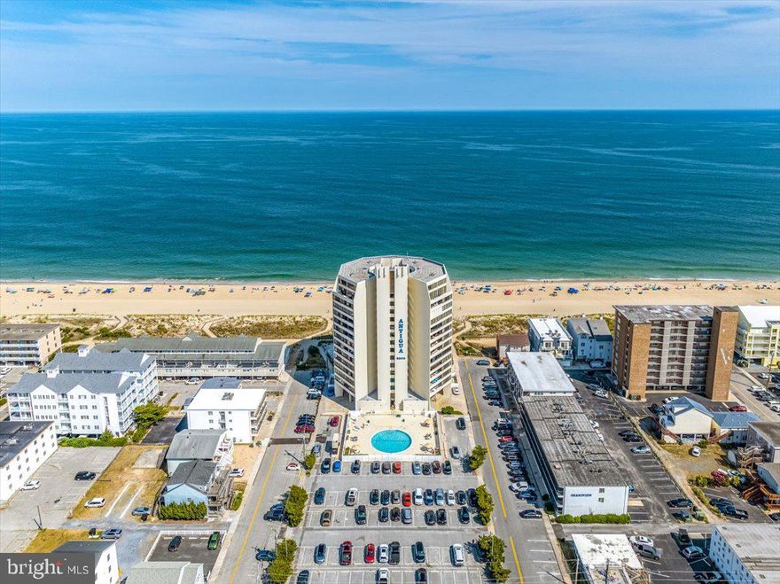 This dreamy beach getaway has all you could ask for and more... This stunning 2 bedroom 2 bathroom turn-key oceanfront condo at Antigua comes fully furnished! Glistening ocean and bay views from the kitchen, living room, primary suite, and private balcony! Gorgeous kitchen with new stainless steel appliances installed in 2016 and new backsplash installed in 2015. Laminate flooring featured throughout the kitchen, living room, and hallway installed in 2015. Enjoy the famous Ocean City sunrises and sunsets from the private balcony with custom granite table and chairs located just off of the open and bright living room. Wake up to spectacular ocean views in the primary suite featuring new carpet and 5-panel doors installed throughout the unit in 2019.  New living room and bedroom furniture purchased in 2017. Amazing master bathroom remodel including a new large vanity and new flooring installed in 2020 and a Bathfitter tub and shower surround with new plumbing and fixtures installed in 2022. Beautifully remodeled hall bathroom with a new tile shower with glass door, new vanity and new plumbing. Spacious second bedroom with new carpet installed in 2019. All walls and ceilings were repainted in 2019. New, highly efficient Geothermal HVAC system and electrical panel installed in 2017, hot water heater installed in 2018, and washer/dryer installed in 2021. The Antigua offers an outdoor heated pool which extends the summer season from early May to late September, sauna, picnic area, ample parking, on-site management, two elevators, and secured lobby. Spacious oceanfront living at its finest!