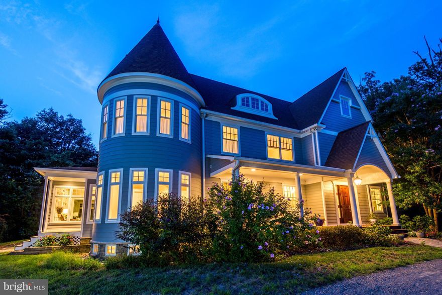 Ultra-private custom built estate with more than 1,000 feet of  water frontage on over 5 acres located in Annapolis on Crab Creek leading to the South River. Wildlife sanctuary setting is only 3 miles from downtown. Private drive leads to this spectacular home with two story rounded turret. Gorgeous Brazilian hardwoods on main level. Soaring two-story family room with floor to ceiling wall of glass windows overlooking the water. Additionally there is a wood burning stone fireplace with raised hearth and stone slab mantle. Gourmet kitchen with granite counter-tops, Kraft maid cabinets, six burner gas stove with grill, double ovens with duel fuel of gas and electric, stainless steel appliances, center island with secondary sink, pendent and recessed lighting, ceramic title, eat-in area and over-sized pantry. Separate butler's pantry with granite counters, sink and wine cooler - all convenient for entertaining. Owner's suite looks at nature and water from the private balcony - what a great way to start the day. Owner's suite has built in gas fireplace and two walk-in closets. Owner's bathroom has double sinks, over-sized jetted tub with brushed nickel fixtures and glass enclosed shower. Lots of unique custom pocket doors throughout. Detached three car garage with studio above. Rough-in located in the basement for potential bathroom.  May 2018 house freshly painted inside and out. Bring your kayak, canoe and paddle board and enjoy this amazing Annapolis waterfront home.