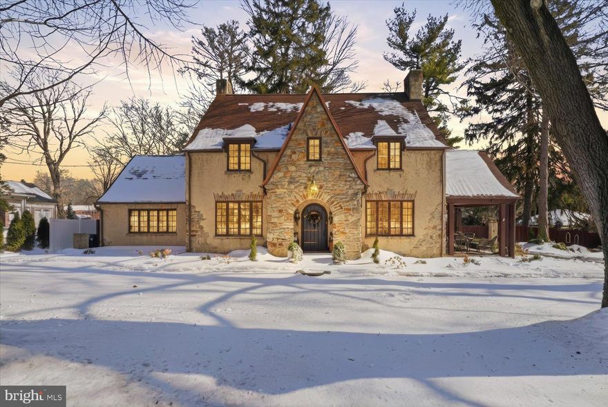 Not every home feels like it belongs in a storybook, but this Tudor style home truly does! Welcome home to 1705 Lititz Pike, where timeless architecture and thoughtful updates create a setting filled with warmth and character with over 3,000 square feet of living space! Hardwood floors lead you from the arched entryway into inviting living spaces anchored by a grand stone fireplace with a woodstove insert that brings both charm and comfort to the main living room. The spacious formal dining room on the main level offers a beautiful setting for gatherings, holidays and everyday moments that deserve something special. The kitchen blends character and function with granite countertops, updated backsplash in 2022, double ovens, recessed lighting and architectural details throughout. French doors open to a private office and a convenient half bath completes the main level. Dual staircases (front and back of home) enhance both flow and character, adding a distinctive touch rarely found today! Upstairs, six bedrooms provide flexibility for family, guests or additional work or hobby space. A remodeled guest suite bath in 2021 offers modern comfort, while the third floor serves as a private retreat with added storage and the partially finished basement expands living space even further! Outside, nearly .63 acres of fenced and beautifully landscaped grounds create a setting that feels private and peaceful. Extensive hardscaping, a pergola, koi pond and a large flat fenced yard make this property ideal for entertaining or quiet evenings at home. Recent improvements include a new roof in 2023, water softener in 2020, boiler installed in 2012, and a newer electric hot water heater. 1705 Lititz Pike is a home where character, space and setting come together beautifully.  Dont sleep on this beauty, schedule your private tour today!