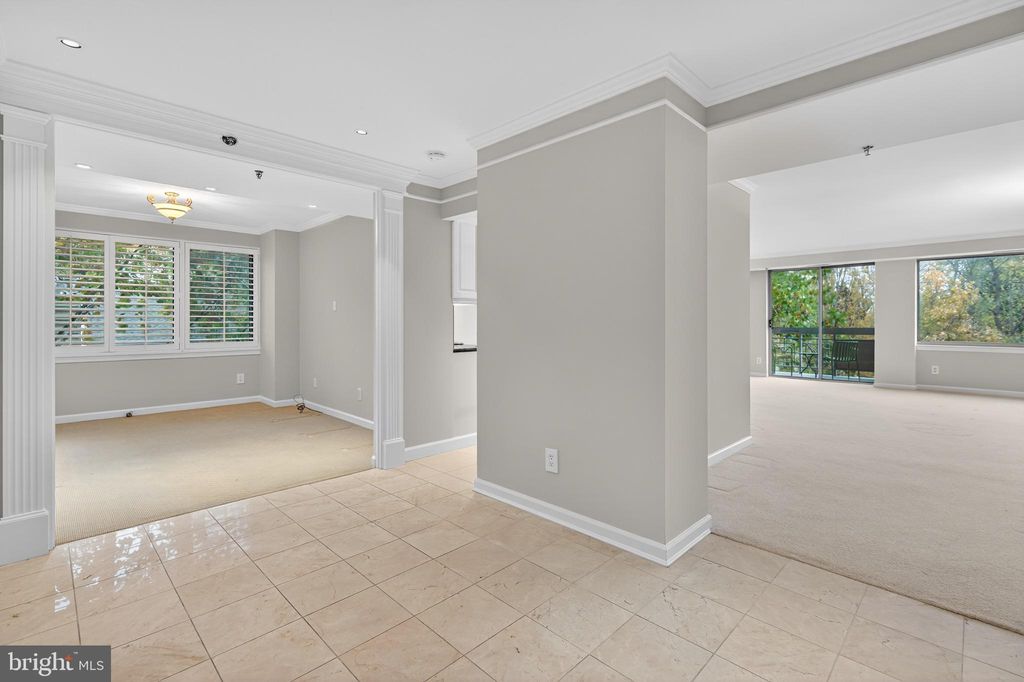 Photo of 5450 Whitley Park Terrace #311, BETHESDA, MD 20814 (MLS # MDMC2204846)
