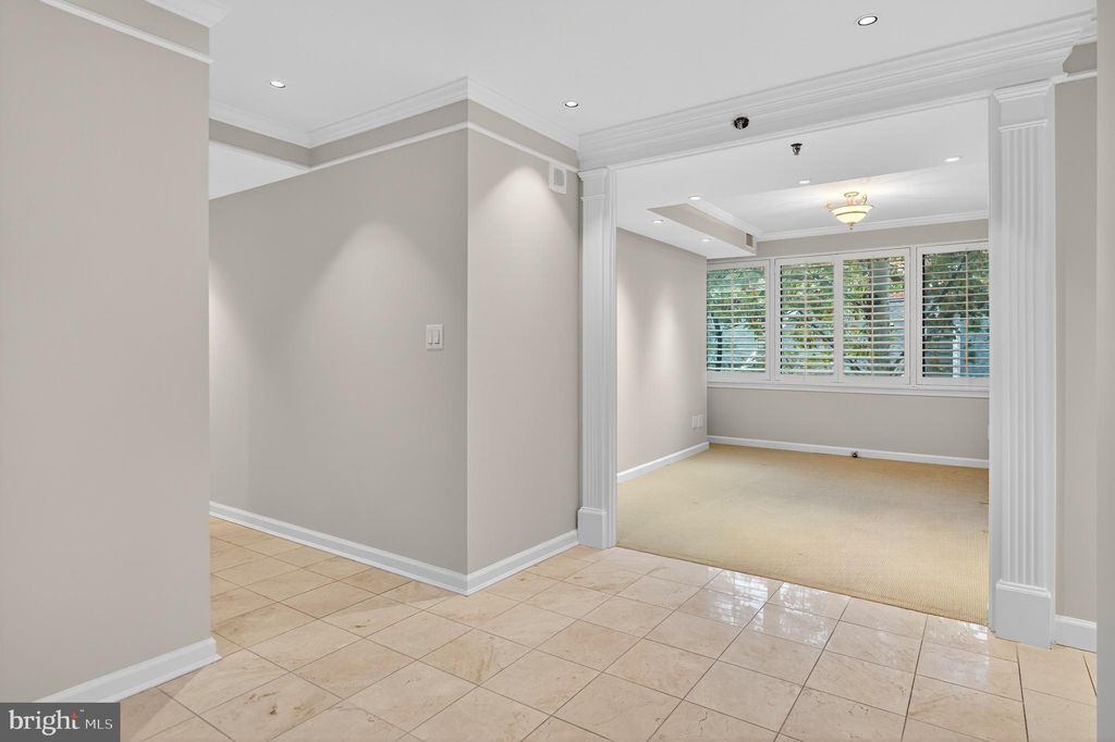 Photo of 5450 Whitley Park Terrace #311, BETHESDA, MD 20814 (MLS # MDMC2204846)