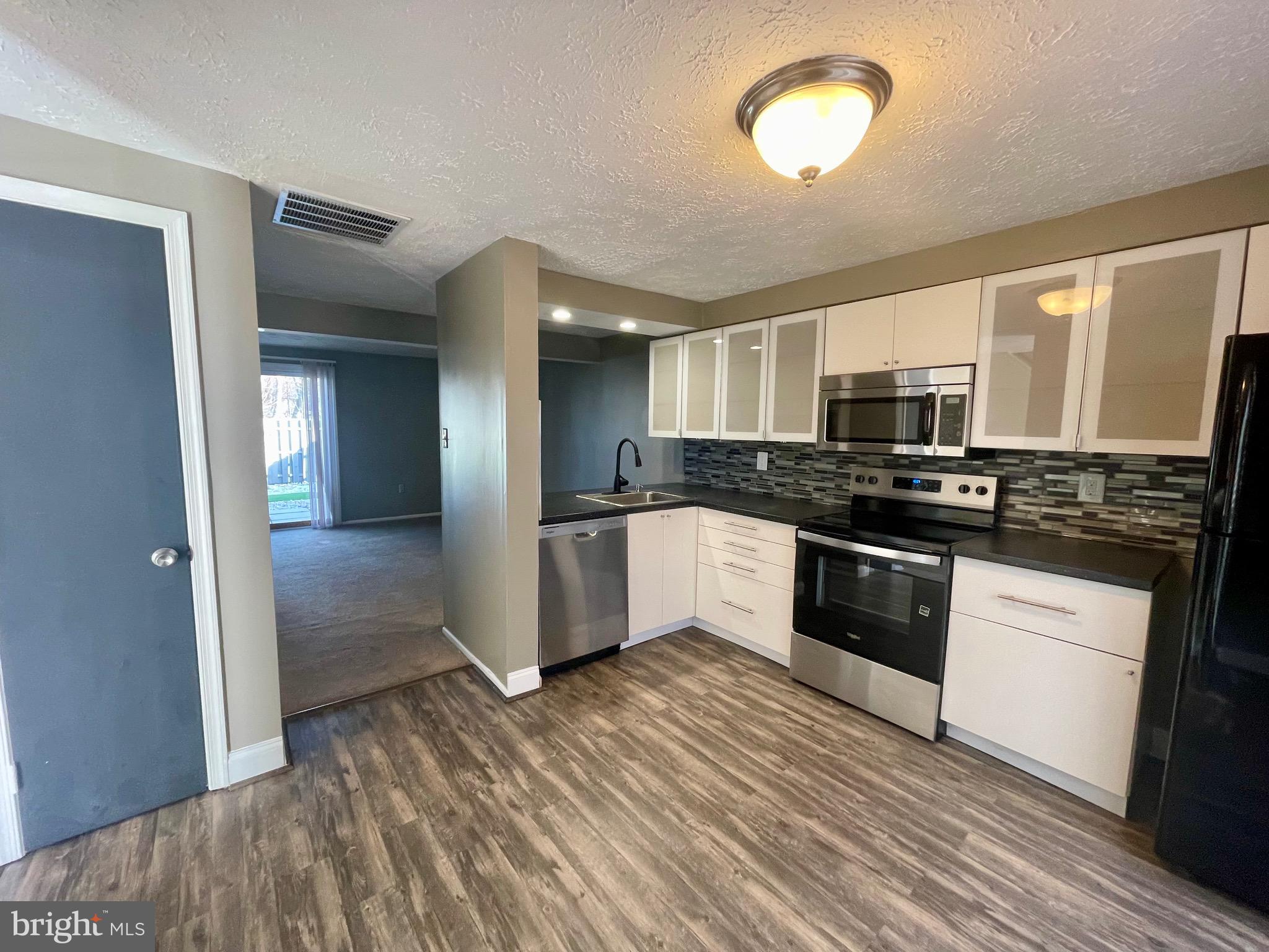 CLINTON PLAZA TOWNHOUSES - Residential Lease