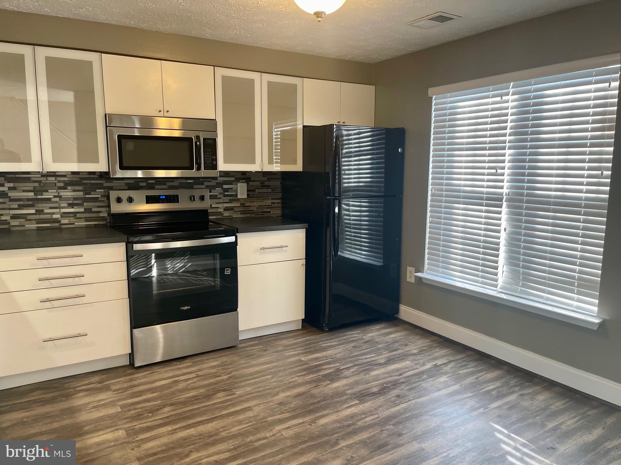 CLINTON PLAZA TOWNHOUSES - Residential Lease