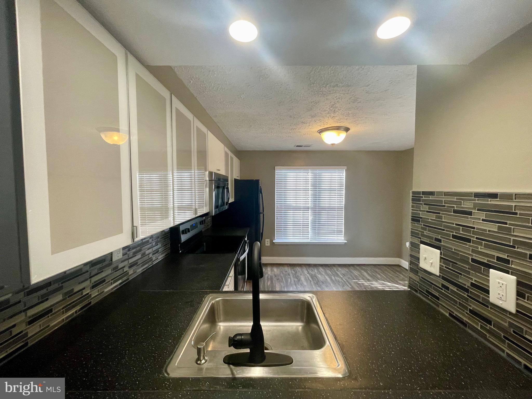 CLINTON PLAZA TOWNHOUSES - Residential Lease