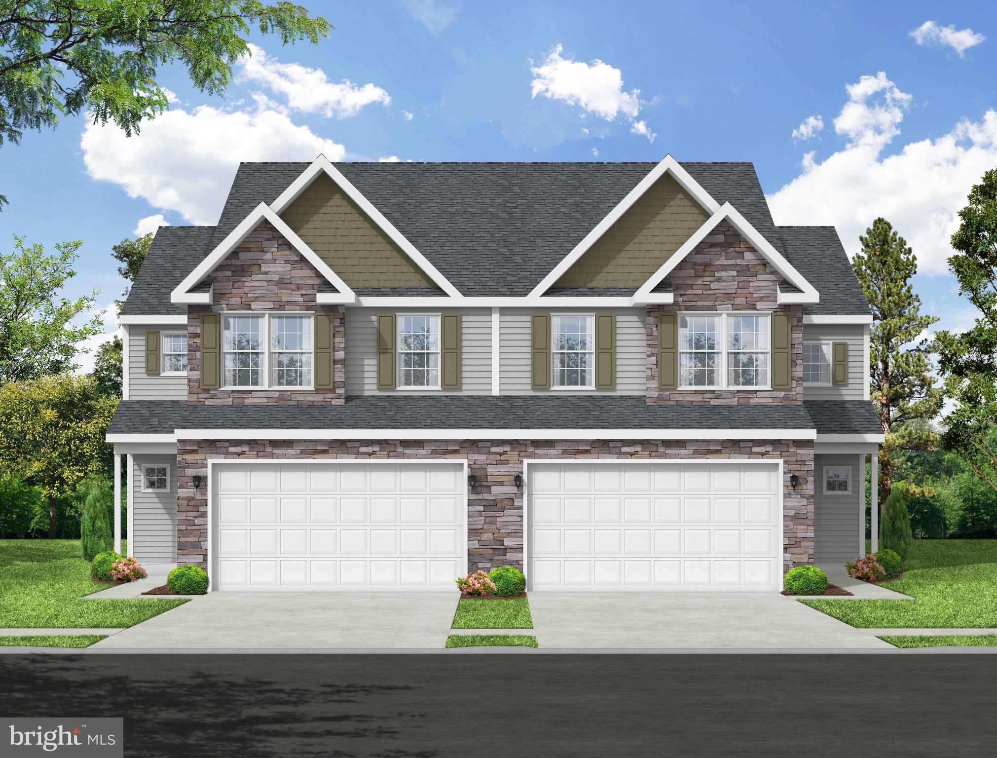 COMING SOON! Delivery late September/early October! Still time to customize this floorplan with WALK-OUT BASEMENT! This spacious Durham design includes over 1,800 square feet of living space. Starting with the unique private/angled entry and covered porch, you're immediately drawn into the living room, with easy access to the two-car garage and first floor powder room. Beyond the living room is the dining room with tray ceiling that is open to the kitchen, providing an air of open living. The L-shaped kitchen includes ample quartz countertops, including an island with an overhang and accented with a lovely tile backsplash! Just up the split staircase is a full bath with linen closet, and two spare bedrooms, each with large closets. Second floor laundry! Finishing off the Durham is the spacious primary suite featuring a sitting area, walk-in closet, and en-suite bathroom with a double vanity, and shower. One year limited builder warranty included!