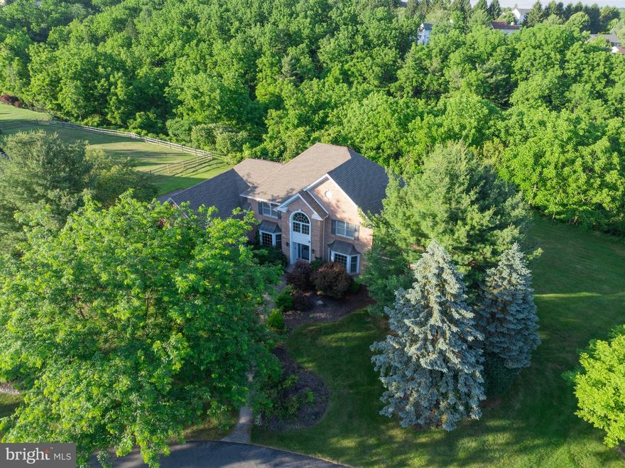 Discover 1936 Wooded Ridge Ct. at Pointe West! Located in the Parkland School Distrcit, this expansive home features 6 bedrooms, 3.5 baths, in over 3500 square feet, (with finished basement, over 5000 sqft), of living space. The 2-story foyer is flanked by the formal living room to your right and the formal dining room to your left. The family room opens in to a large eart-in kitchen, which has a center island, stainless steel appliances and an endless amount of cabinets for storage. Beyond the kitchen is the mudroom, where the laundry room is located and closets for even more storage. Perfect for a growing family or hosting friends and families. It is yours just in time before the next school year begins. The fully finished basement with a rec-room and bar is the perfect retreat. Your new home, on a quiet clu-de-sac, with views of the hills and valley, offers just the right blend of comfort and functionality. The serene outdoor space offers a lot of privacy and tranquility, perfect after a long week of running around. It is definitely move in ready. Do not miss out on this beautiful home. Make your appointment today!