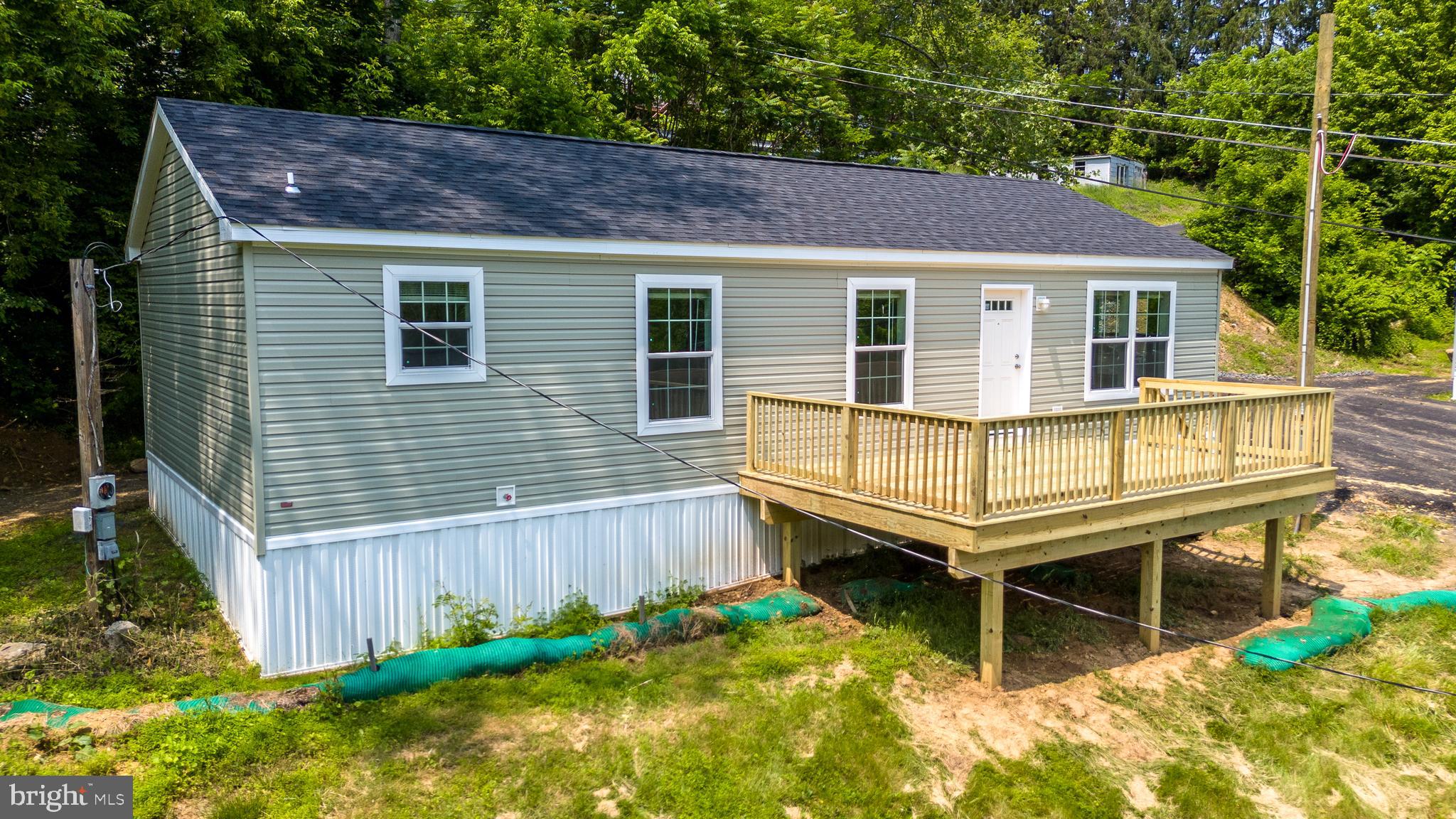 Welcome to this brand-new manufactured home in Royal Manor Village, a peaceful and private residential community of 8 home sites, just 10 minutes from both Bethlehem and Easton, and only 5 minutes from I-78. Set against a backdrop of beautiful long-distance views, this home offers a quiet rural feel with easy access to major routes, shopping, and dining. Nature lovers will enjoy being close to outdoor attractions like the Delaware River and Canal, Fry’s Run Park, and Mariton Wildlife Sanctuary. Featuring Bed Three ooms / Two Baths and 1120 sq.ft of thoughtfully designed living space, this move-in ready home combines comfort, efficiency, and modern convenience. The community has been fully updated with a newly paved private road and, offering low-maintenance, living in a scenic setting. Water, sewer, roadway snowplowing, and common area grass cutting is included. Whether you are a first-time buyer, looking to downsize, or simply seeking a peaceful place to call home, this is a great opportunity to enjoy a fresh start in a beautifully finished new home.