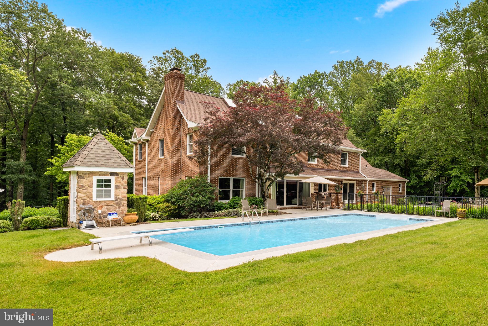 7950 WOODLAND HILLS LANE