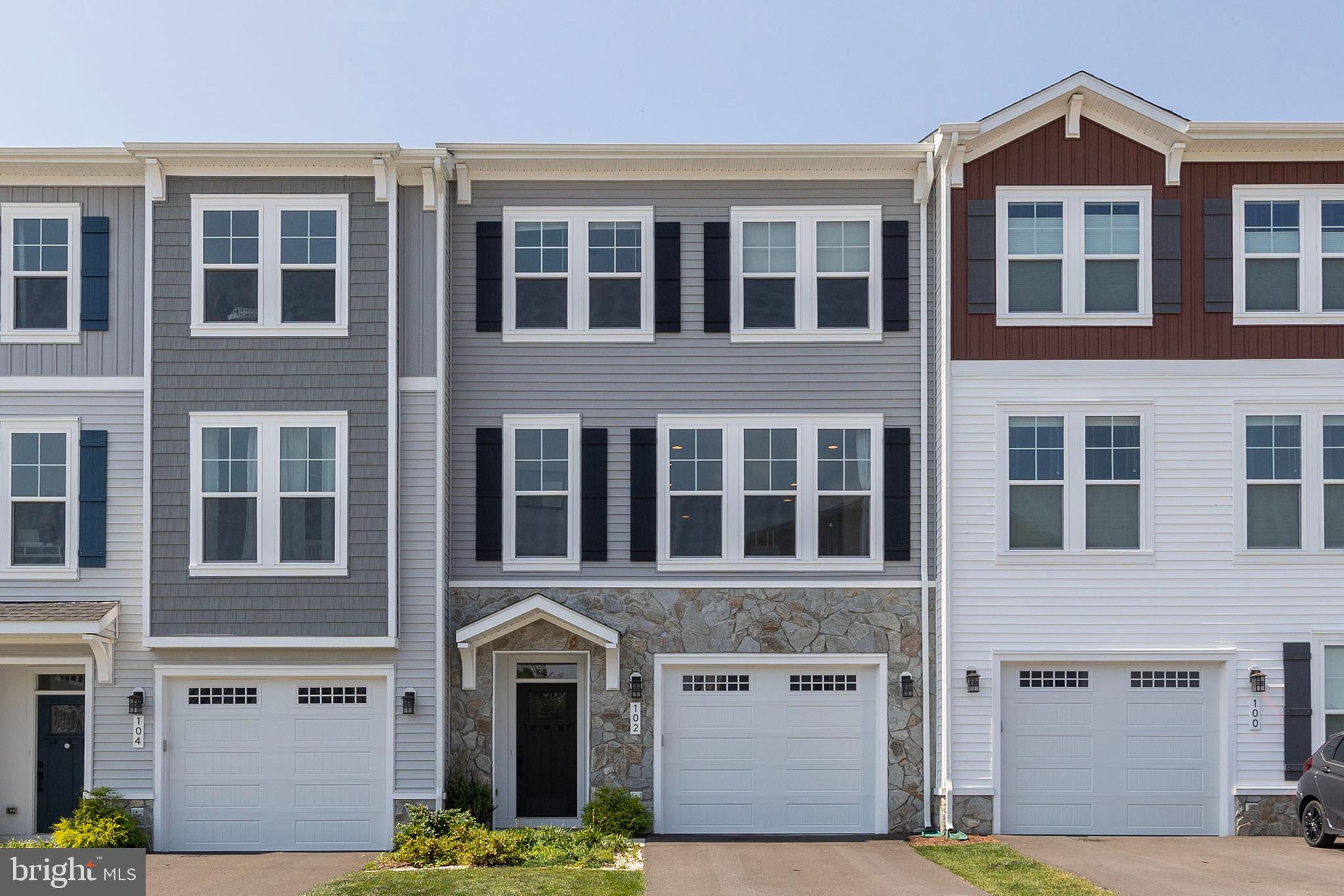 Welcome to 102 Phacelia Way, located in the highly desirable gated community of Lake Frederick! Built in 2023, this spacious 3-bedroom, 3.5-bath home offers comfort, convenience, and ample space for everyday living and entertaining—all within a serene, amenity-rich lakeside setting. The entry level features a versatile family room with a custom accent wall, vinyl plank flooring, and a full bath. Upstairs, the beautifully appointed kitchen includes high-end gas appliances, premium countertops, a walk-in pantry, and a large island. It opens seamlessly into the dining and living areas, which also feature a built-in desk nook—perfect for working from home. The top level offers a luxurious primary suite with a walk-in closet, dual-sink vanity, and oversized tiled walk-in shower. Two additional bedrooms and another full bath complete the upper level, creating a private and comfortable retreat. Enjoy low-maintenance living with access to resort-style amenities, including a clubhouse, fitness center, walking trails, lake access, and more. Whether you’re entertaining, relaxing, or working remotely, 102 Phacelia Way delivers the perfect blend of style, function, and community.